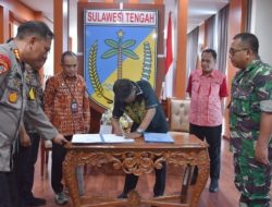 Perjanjian Hibah Daerah untuk Pengamanan Pilkada 2024: Komitmen Sulawesi Tengah untuk Demokrasi Aman