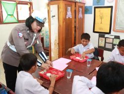Polres Parigi Moutong Bagikan Makanan Bergizi Gratis untuk Siswa SDN Inti Pangi